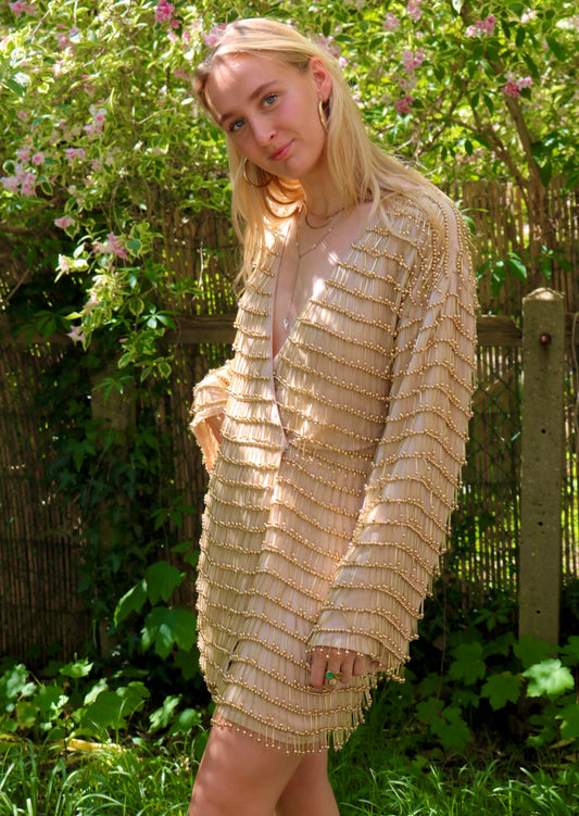 Exclusief te huur bij Pineloue: De Asos Design Gold Party Dress.